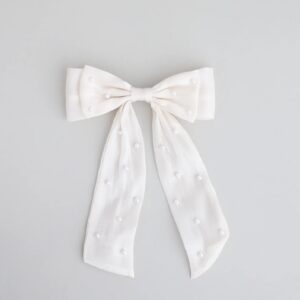 Tied With a Pearl Hair Bow
